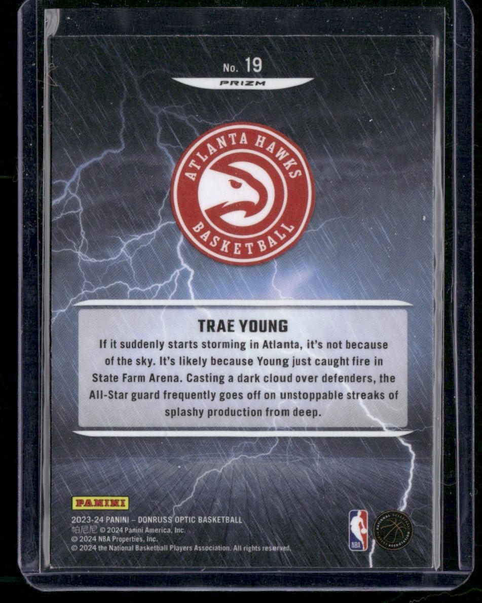 2023-24 Donruss Optic #19 Trae Young Raining 3s Holo
